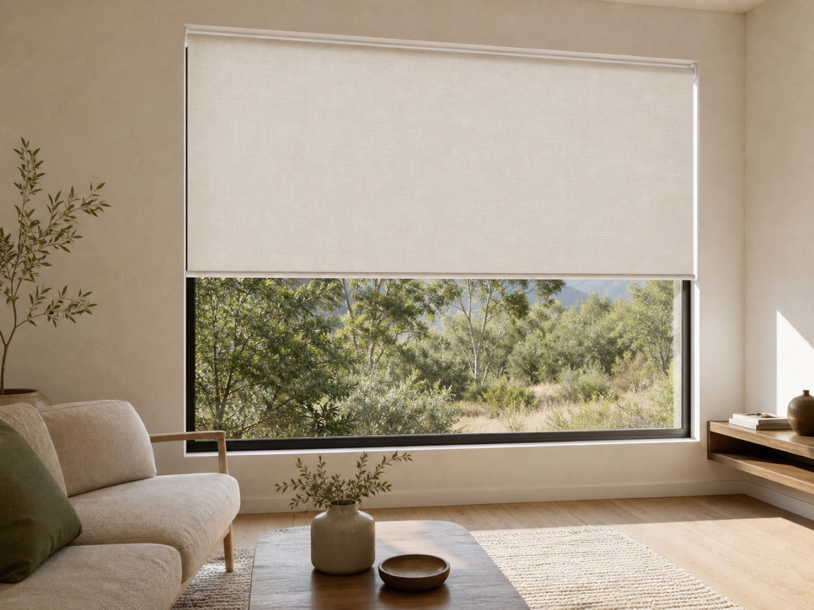 Light-filtering roller blind in a calm contemporary living room